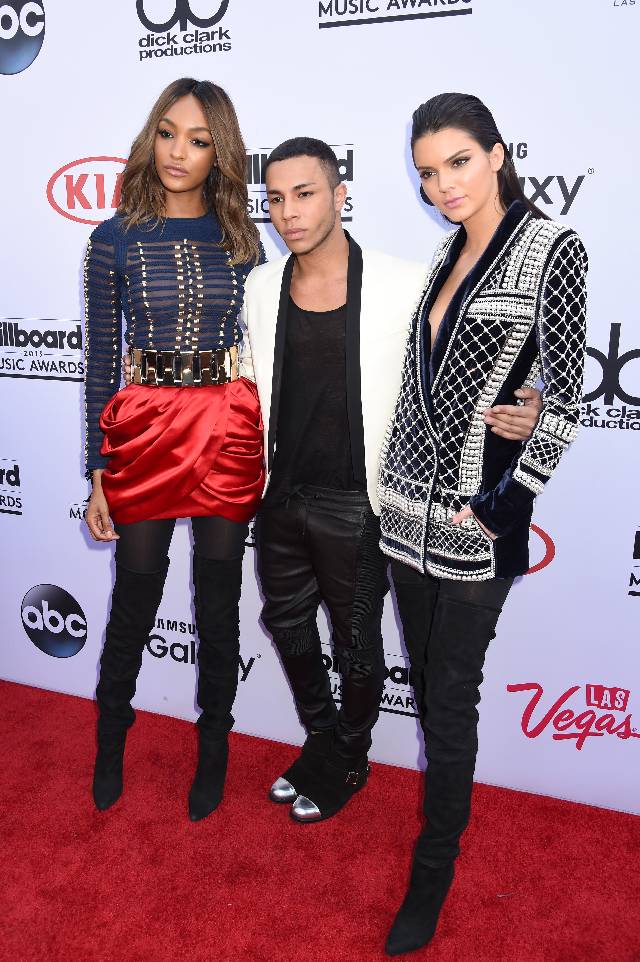 LAS VEGAS, NV - MAY 17: (L-R) Model Jourdan Dunn, designer Olivier Rousteing and model Kendall Jenner, all wearing Balmain x H&M, attend the 2015 Billboard Music Awards at MGM Grand Garden Arena on May 17, 2015 in Las Vegas, Nevada. (Photo by Jeff Kravitz/BMA2015/FilmMagic)