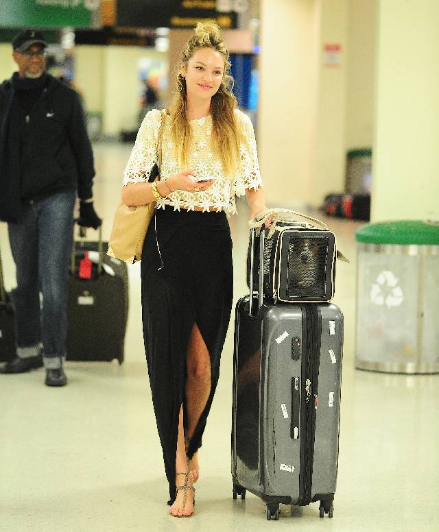 NEW YORK, NY - JANUARY 20: Candice Swanepoel is seen at JFK Airport on January 20, 2013 in New York City. (Photo by Alo Ceballos/FilmMagic)