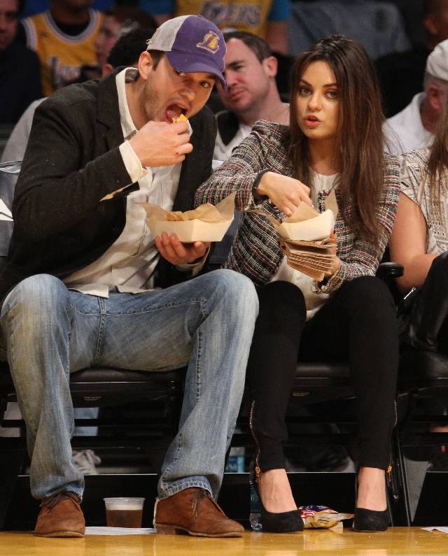 Tuesday March 4, 2014; Celebs out at the Lakers game. The New Orleans Pelicans defeated theLos Angeles Lakers by the final score of 132-125 at Staples Center in downtown Los Angeles, CA. Featuring: Ashton Kutcher,Mila Kunis Where: Los Angeles, California, United States When: 05 Mar 2014 Credit: WENN.com