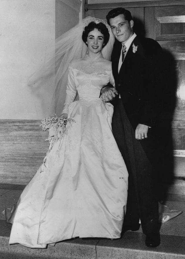 American actress Elizabeth Taylor and hotelier Conrad Hilton after their wedding in Hollywood. (Photo by Keystone/Getty Images)