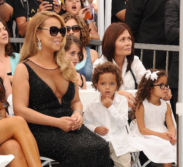 HOLLYWOOD, CA - AUGUST 05: Mariah Carey and children Moroccan Scott Cannon and Monroe Cannon attend Carey's induction into the Hollywood Walk of Fame on August 5, 2015 in Hollywood, California. (Photo by Jason LaVeris/FilmMagic)