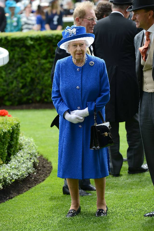 ASCOT, ENGLAND - JUNE 17: Queen Elizabeth II is seen in the parade ring during Royal Ascot 2015 at Ascot racecourse on June 17, 2015 in Ascot, England. (Photo by Kirstin Sinclair/Getty Images for Ascot Racecourse)