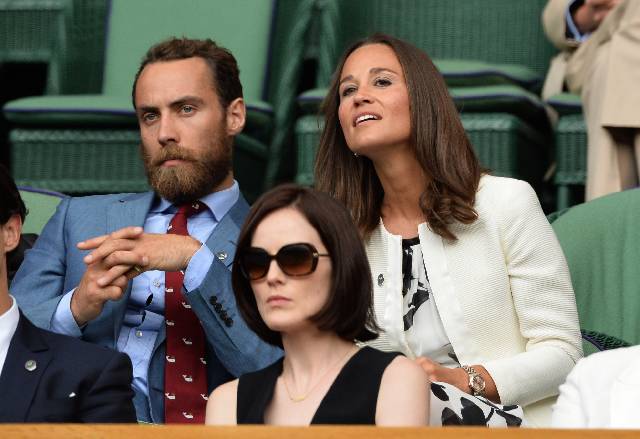 LONDON, ENGLAND - JUNE 26: (L-R) James Middleton, Michelle Dockery and Pippa Middleton attend the Angelique Kerber v Heather Watson match on centre court during day four of the Wimbledon Championships at Wimbledon on June 26, 2014 in London, England. (Photo by Karwai Tang/WireImage)