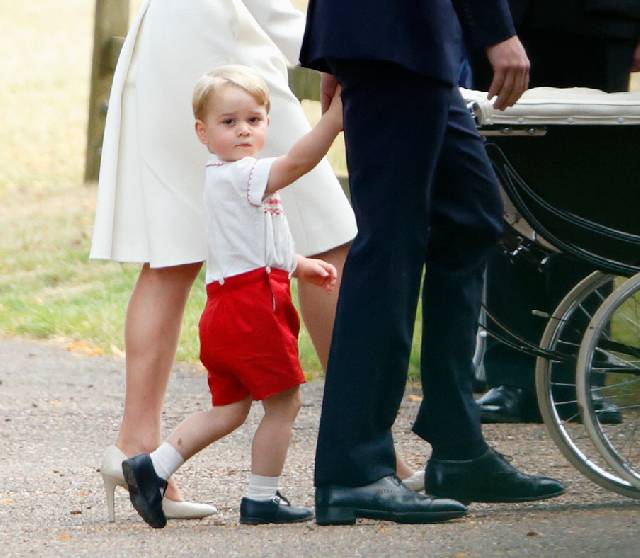 KING'S LYNN, UNITED KINGDOM - JULY 05: (EMBARGOED FOR PUBLICATION IN UK NEWSPAPERS UNTIL 48 HOURS AFTER CREATE DATE AND TIME) Prince George of Cambridge attends the christening of Princess Charlotte of Cambridge at the church of St Mary Magdalene on the Sandringham Estate on July 5, 2015 in King's Lynn, England. (Photo by Max Mumby/Indigo/Getty Images)