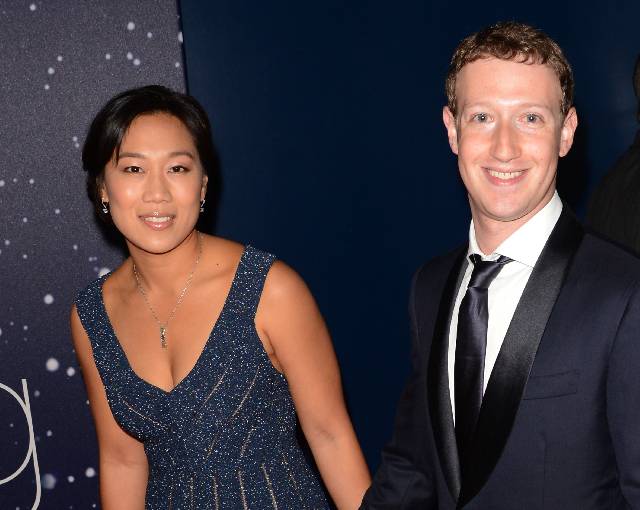 MOUNTAIN VIEW, CA - NOVEMBER 09: Priscilla Chan and Mark Zuckerberg attend the 2014 Breakthrough Prize Awards at NASA AMES Research Center on November 9, 2014 in Mountain View, California. (Photo by C Flanigan/FilmMagic)