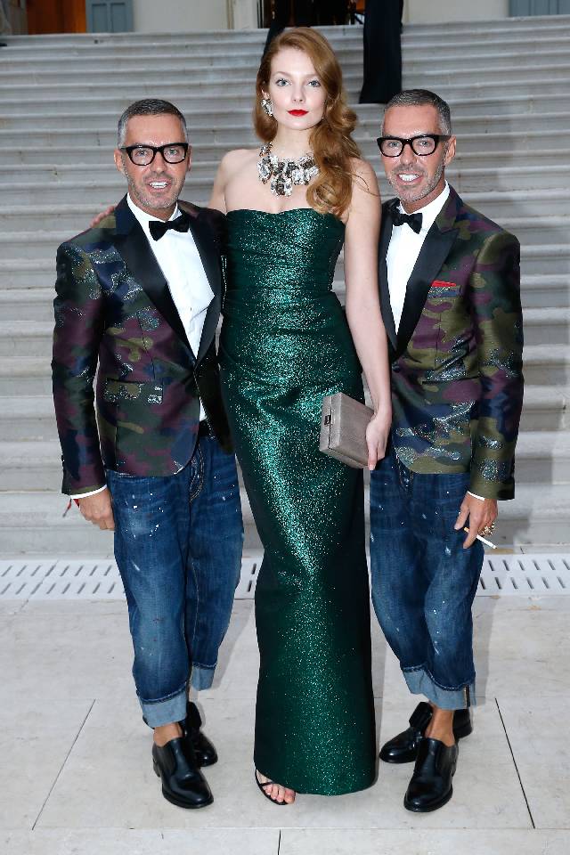 CAP D'ANTIBES, FRANCE - MAY 22: Eniko Mihalik standing between Dean Caten and Dan Caten attend amfAR's 21st Cinema Against AIDS Gala Presented By WORLDVIEW, BOLD FILMS, And BVLGARI at Hotel du Cap-Eden-Roc on May 22, 2014 in Cap d'Antibes, France. (Photo by Bertrand Rindoff Petroff/amfAR14/WireImage)