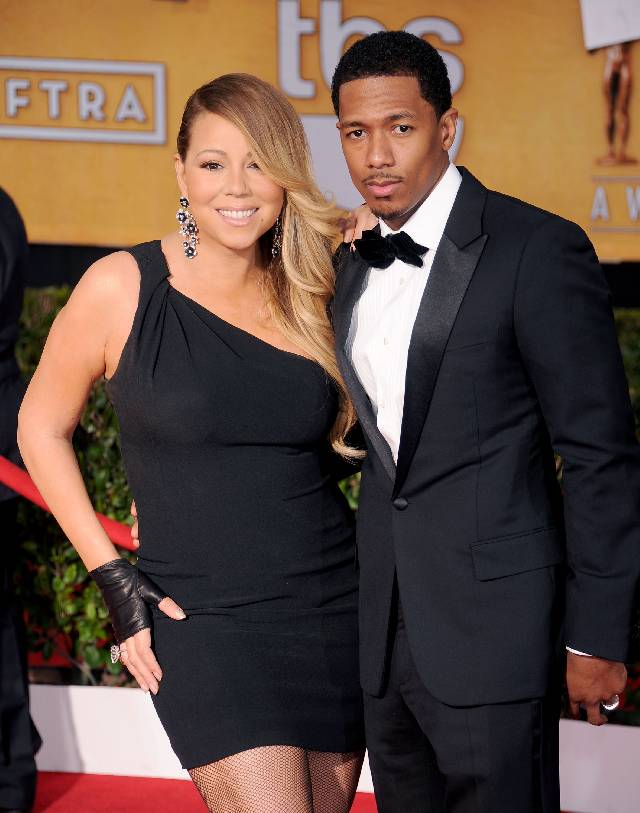 LOS ANGELES, CA - JANUARY 18: Singer Mariah Carey and actor/TV personality Nick Cannon arrive at the 20th Annual Screen Actors Guild Awards at The Shrine Auditorium on January 18, 2014 in Los Angeles, California. (Photo by Gregg DeGuire/WireImage)