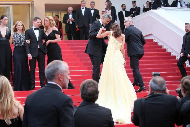 CANNES, FRANCE - MAY 12: George Clooney and his wife Amal Clooney attend the 